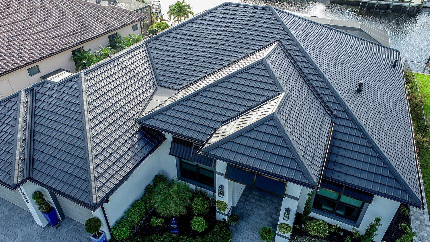 Como Raven Black metal roof — A striking modern residence in Fort Lauderdale, Florida.